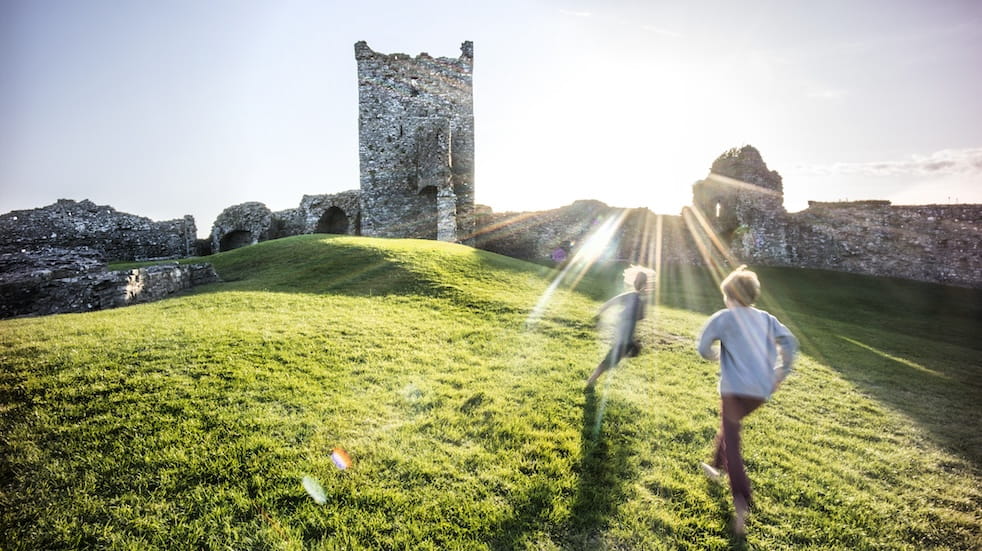 Two young boys exploring a Castle in Wales
